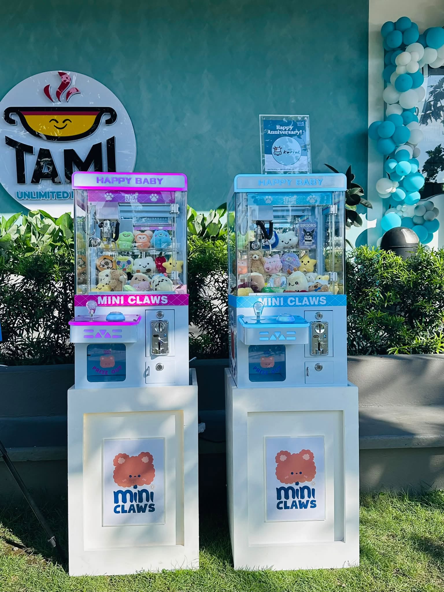 Pink and blue Happy Baby claw machines